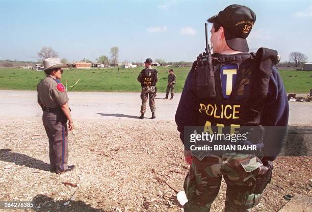 Agents from the Bureau of Alcohol, Tobacco and Firearms and local Texan authorities shown in a file photo dated 26 March 1993 standing at a...