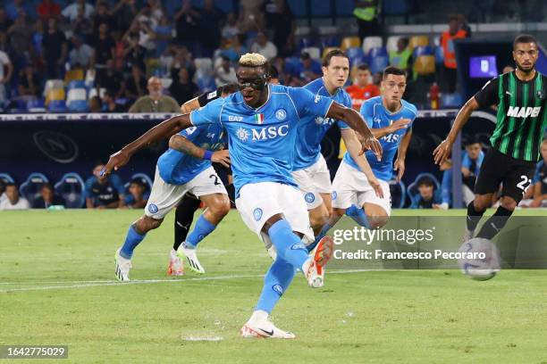 Victor Osimhen of SSC Napoli scores the 1-0 goal during the Serie A TIM match between SSC Napoli and US Sassuolo at Stadio Diego Armando Maradona on...