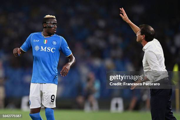 Victor Osimhen of SSC Napoli listens to his head coach Rudi Garcia during the Serie A TIM match between SSC Napoli and US Sassuolo at Stadio Diego...