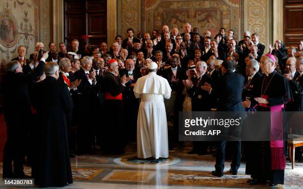 Pope Francis greets foreign diplomats during an audience with the diplomatic corps at the Vatican on March 22, 2013. Pope Francis called for the...