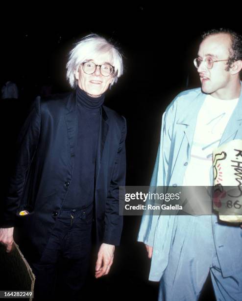 Artist Andy Warhol and artist Keith Haring attend Brooke Shields' 21st Birthday Party on May 31, 1986 at Nishi Noho, 380 Lafayette Street in New York...