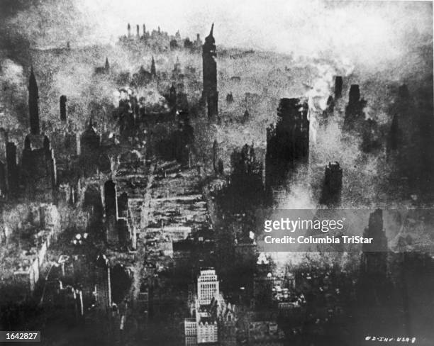 Aerial view of the destroyed, smoking ruins of New York City in a still from the film, 'Invasion USA,' 1952.