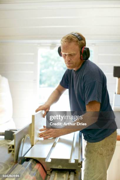 man working in woodshop - 40 44 years blond hair mature man factory stock pictures, royalty-free photos & images