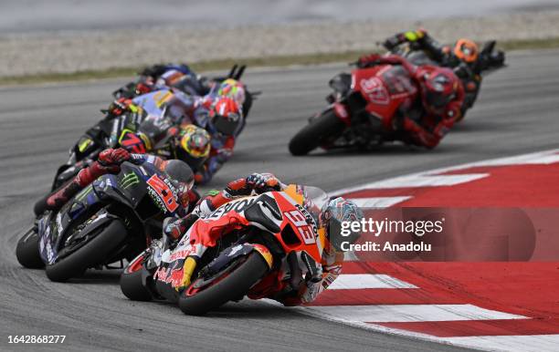 Fabio Quartararo of Monster Energy Yamaha MotoGP, and Marc Marquez of Repsol Honda Team compete during the Catalunya Moto Grand Prix at the Circuit...