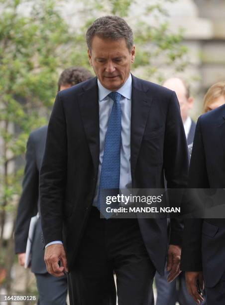 Chairman Carl-Henric Svanberg walks to the West Wing of the White House for a meeting with US President Barack Obama June 16, 2010 in Washington, DC....