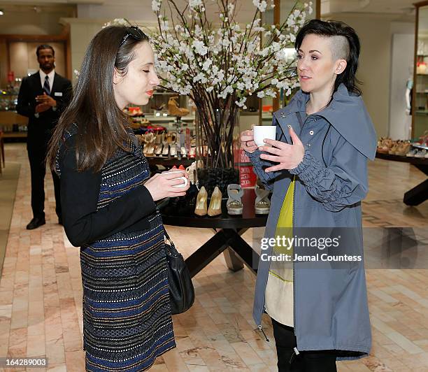 Writer Allison Cohn of Elle speaks with designer Michelle Franklin during an in-store visit to the Lord & Taylor Flagship store on March 22, 2013 in...