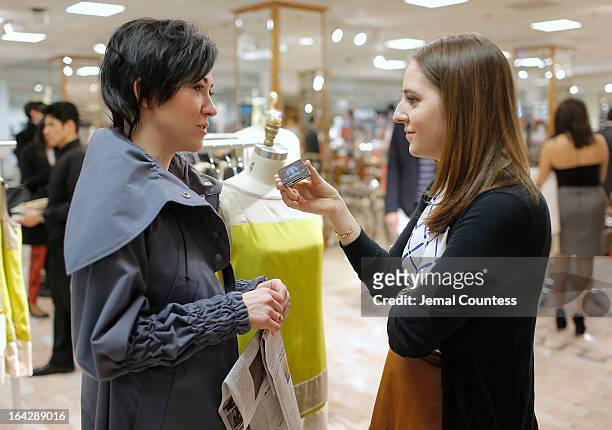 Designer Michelle Franklin speaks with Jennifer Davis of Instyle during an in-store visit to the Lord & Taylor Flagship store on March 22, 2013 in...