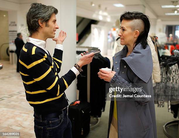 Members of the media speak with designer Michelle Franklin during an in-store visit to the Lord & Taylor Flagship store on March 22, 2013 in New York...