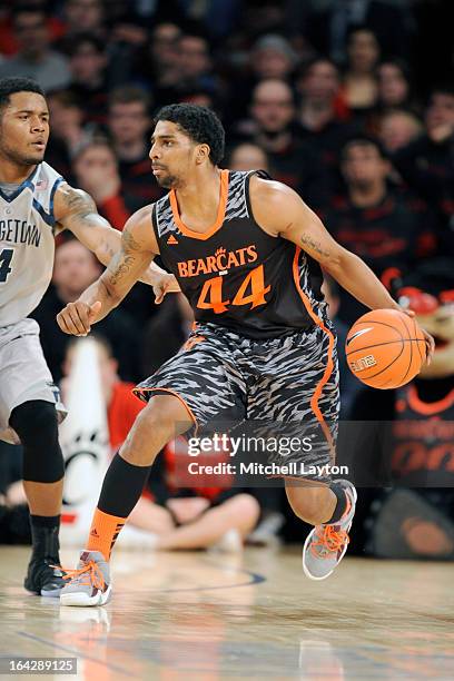 JaQuon Parker of the Cincinnati Bearcats dribbles the ball during a quarterfinal Big East Basketball Tournament game against the Georgetown Hoyas at...