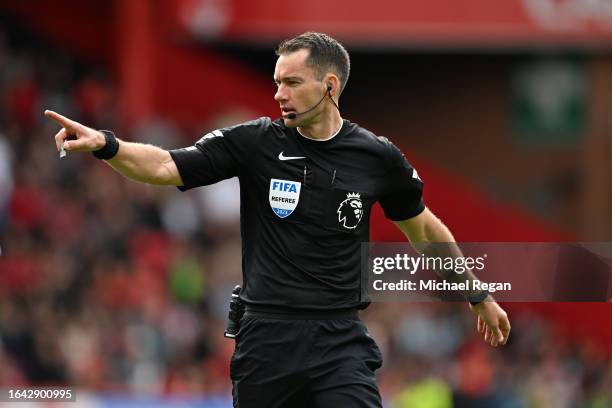 Referee Jarred Gillett gestures during the Premier League match between Sheffield United and Manchester City at Bramall Lane on August 27, 2023 in...