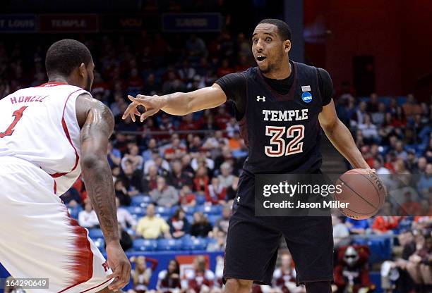 Rahlir Hollis-Jefferson of the Temple Owls handles the ball against Richard Howell of the North Carolina State Wolfpack in the first half during the...