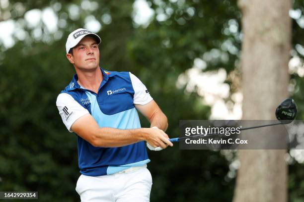 Viktor Hovland of Norway plays his shot from the seventh tee during the final round of the TOUR Championship at East Lake Golf Club on August 27,...