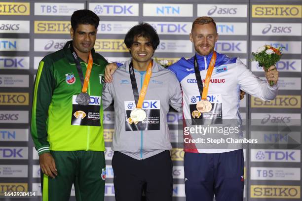 Silver medalist Arshad Nadeem of Team Pakistan, Gold medalist Neeraj Chopra of Team India, and Bronze medalist Jakub Vadlejch of Team Czech Republic...