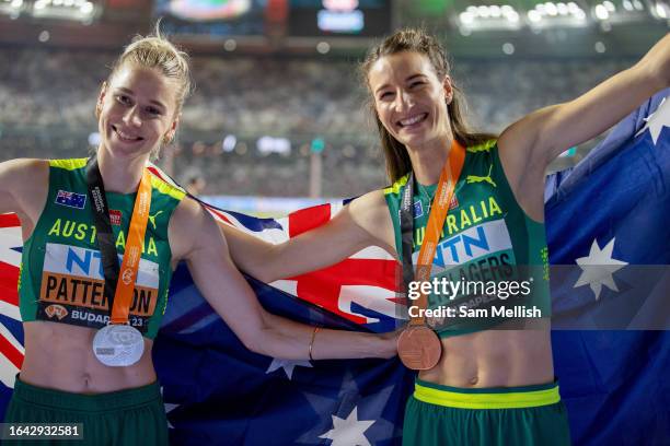 Eleanor Patterson and Elena Kulichenko of Australia pose for photos following the Women's high Jump final during day nine of the World Athletics...