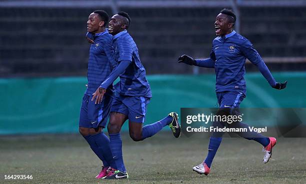 Anthony Martial, Seko Fofana and Louis Nganioni of France celebrate their team's second goal during the U18 International Friendly match between...