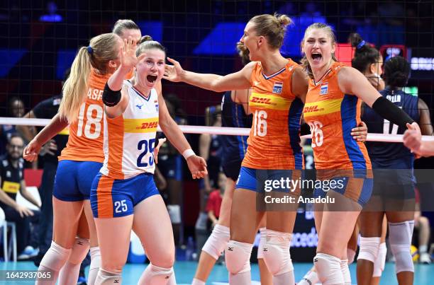 Players of the Netherlands celebrate after winning the second set of the 2023 CEV EuroVolley Women bronze medal match between Italy and Netherlands,...