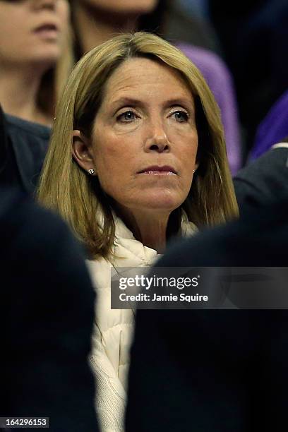 Megan Weber, wife of head coach Bruce Weber of the Kansas State Wildcats, watches play against the La Salle Explorers in the first half during the...