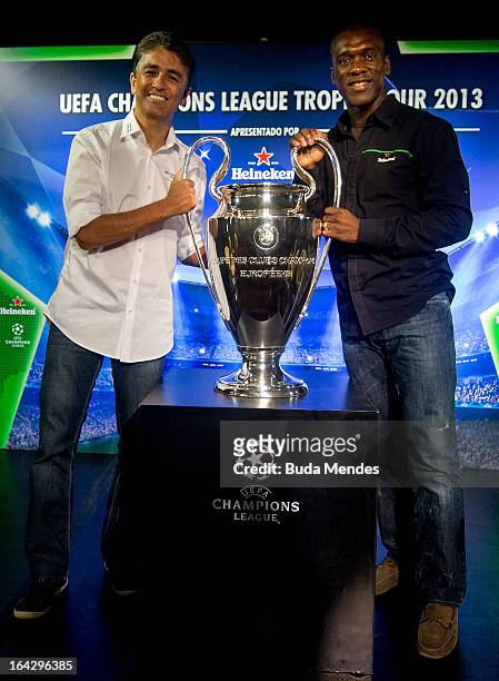 Ambassadors Bebeto and Clarence Seedorf pose with the UEFA Champions League trophy during the UEFA Champions League Trophy Tour 2013 at Casa Miranda...