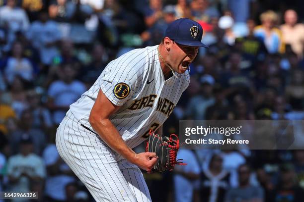 Trevor Megill of the Milwaukee Brewers reacts to the third out of the ninth inning against the San Diego Padres at American Family Field on August...
