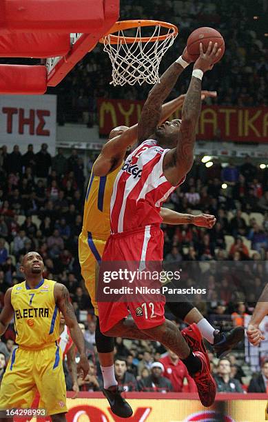 Josh Powel, #12 of Olympiacos Piraeus in action during the 2012-2013 Turkish Airlines Euroleague Top 16 Date 12 between Olympiacos Piraeus v Maccabi...