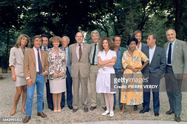 President of Antenne 2 channel television Claude Contamine poses with his new team, TV hosts, Marie-Ange Nardi , Michel Drucker , Eve Ruggieri ,...