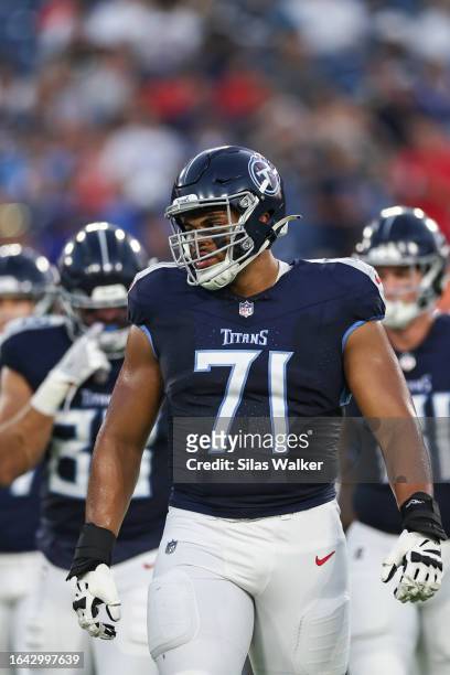 Andre Dillard of the Tennessee Titans on the field against the New England Patriots during the preseason game at Nissan Stadium on August 25, 2023 in...