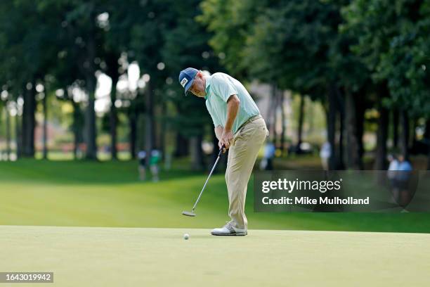 Jeff Maggert of the United States hits a putt on the 16th hole during the final round of the The Ally Challenge presented by McLaren at Warwick Hills...