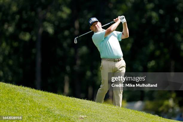 Jeff Maggert of the United States hits an approach shot on the ninth hole during the final round of the The Ally Challenge presented by McLaren at...