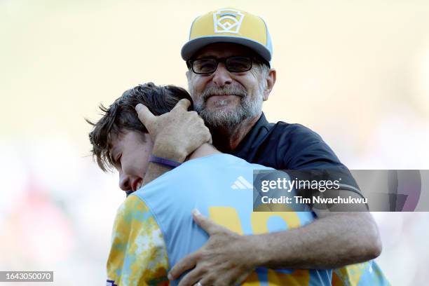Danny Boehle, manager, and Louis Lappe of the West Region team from El Segundo, California celebrate after winning the Little League World Series...
