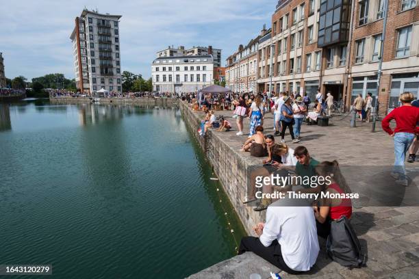 People enjoy the Braderie de Lille on 'Quay du Wault' on September 3, 2023 in Lille, Nord, France. The Braderie de Lille is one of the largest flea...