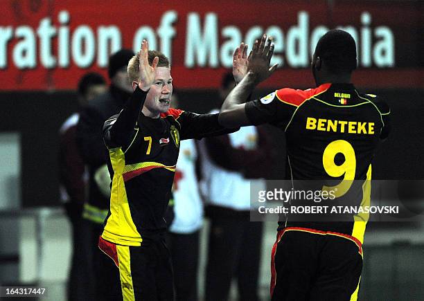 Belgium's Kevin De Bruyne celebrates with teammates after scoring against Macedonia during a World Cup 2014 qualifying match at the Filip II stadium...