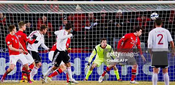 Hamdi Salihi scores for Albania during Norway vs Albania FIFA 2014 World Cup qualifying football match in Oslo, on March 22, 2013. AFP PHOTO /...