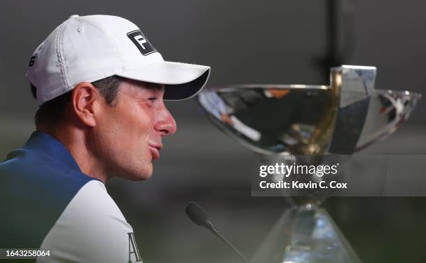 Viktor Hovland of Norway speaks to the media after winning the TOUR Championship and FedExCup at East Lake Golf Club on August 27, 2023 in Atlanta,...