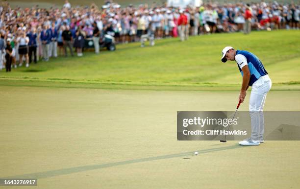 Viktor Hovland of Norway putts on the 18th green on his way to winning the FedExCup during the final round of the TOUR Championship at East Lake Golf...