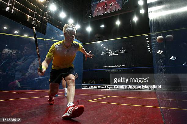James Willstrop of England in action against Peter Barker of England in the final of the Canary Wharf Squash Classic on March 22, 2013 in London,...