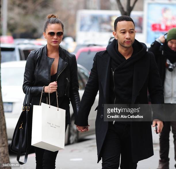 Chrissy Teigen and John Legend are seen in the East Village on March 22, 2013 in New York City.