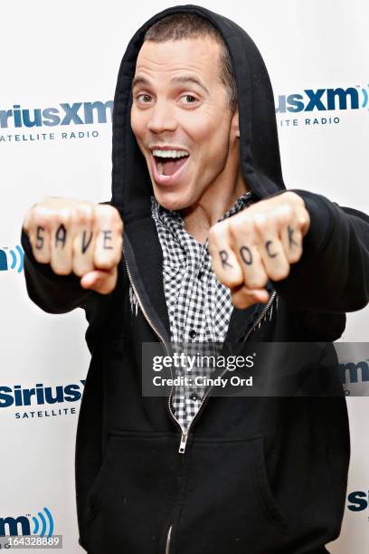 Comedian/ TV personality Steve-O shows off his sharpie altered 'TV friendly' tattoos at the SiriusXM Studios on March 22, 2013 in New York City.