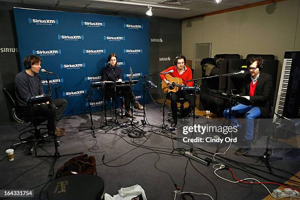 Thomas Mars, Deck d'Arcy, Christian Mazzala and Laurent Brancowitzi of Phoenix perform at the SiriusXM Studios on March 22, 2013 in New York City.