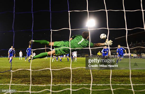 Goalkeeper Aldo Simoncini of San Marino fails to stop a free kick from Wayne Rooney of England during the FIFA 2014 World Cup Qualifier Group H match...