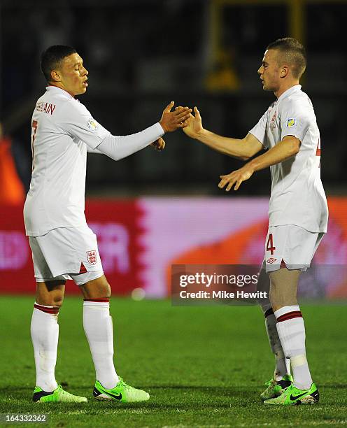 Alex Oxlade-Chamberlain of England celebrates his goal with Tom Cleverley during the FIFA 2014 World Cup Qualifier Group H match between San Marino...