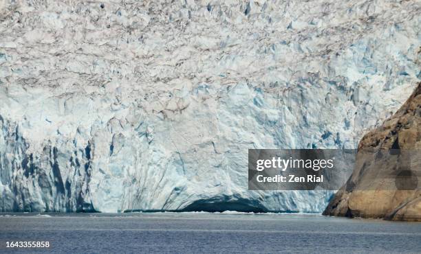 glacier cave in prince christian sound, greenland - prince christian sound greenland stock pictures, royalty-free photos & images