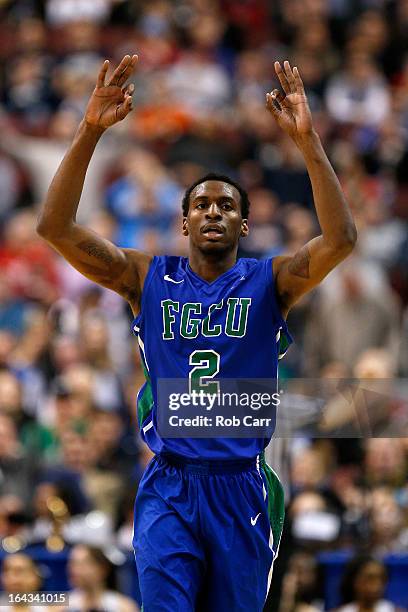 Bernard Thompson of the Florida Gulf Coast Eagles reacts after he made a 3-point basket in the first half against the Georgetown Hoyas during the...