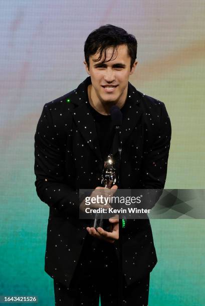Chris Olsen accepts the Streamy Award for Short Form onstage during the 2023 Streamy Awards at Fairmont Century Plaza on August 27, 2023 in Los...