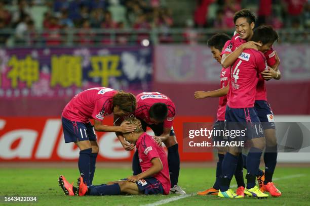 Ryo Nagai of Cerezo Osaka celebrates with his teammates after scoring his team's second goal during the J.League J1 match between Cerezo Osaka and...