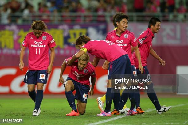 Ryo Nagai of Cerezo Osaka celebrates with his teammates after scoring his team's second goal during the J.League J1 match between Cerezo Osaka and...