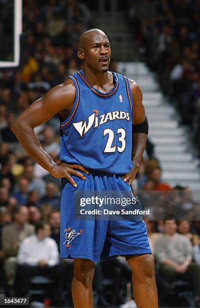 Michael Jordan of the Washington Wizards looks on during the NBA game against the Toronto Raptors at the Air Canada Centre on October 30, 2002 in...