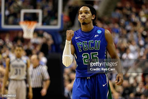 Sherwood Brown of the Florida Gulf Coast Eagles celebrates late in the second half against the Georgetown Hoyas during the second round of the 2013...