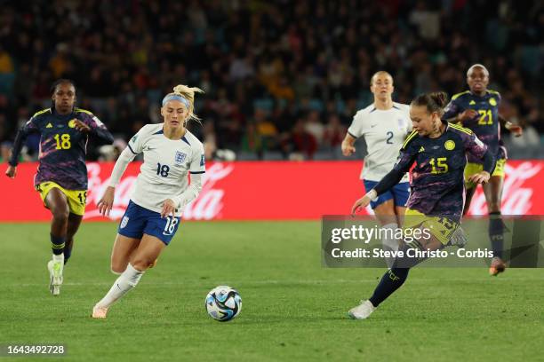 Chloe Kelly of England is challenged by Colombia's Ana Guzman during the FIFA Women's World Cup Australia & New Zealand 2023 Quarter-Final match...