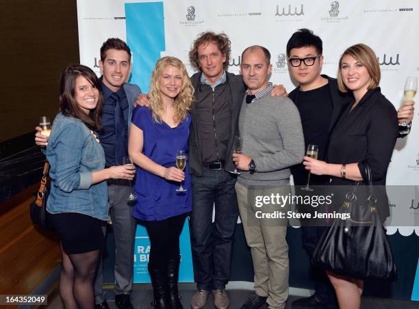 Designer Yves Behar poses with members of the Fuseproject Team attend the WHOLE WORLD Water launch event at Parallel 37 at The Ritz-Carlton, San...