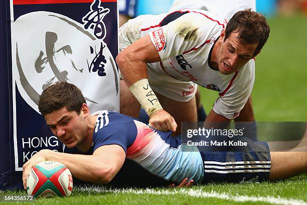 Steeve Barry of France scores a try during the match between France and the USA on day two of the 2013 Hong Kong Sevens at Hong Kong Stadium on March...